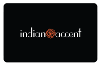indian accent logo over black background